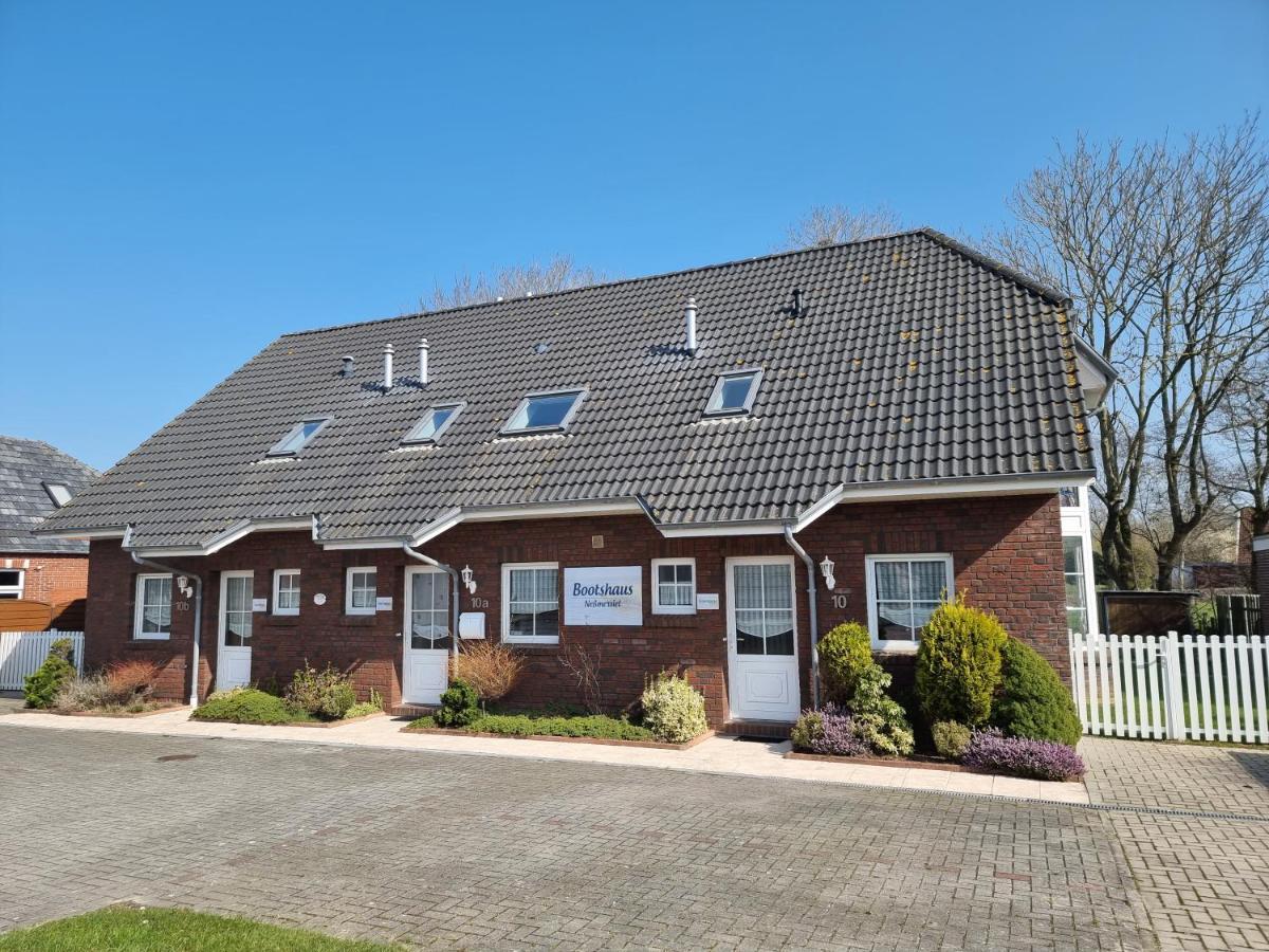 Ferienhaus Steuerbord Im Bootshaus Neßmersiel Esterno foto
